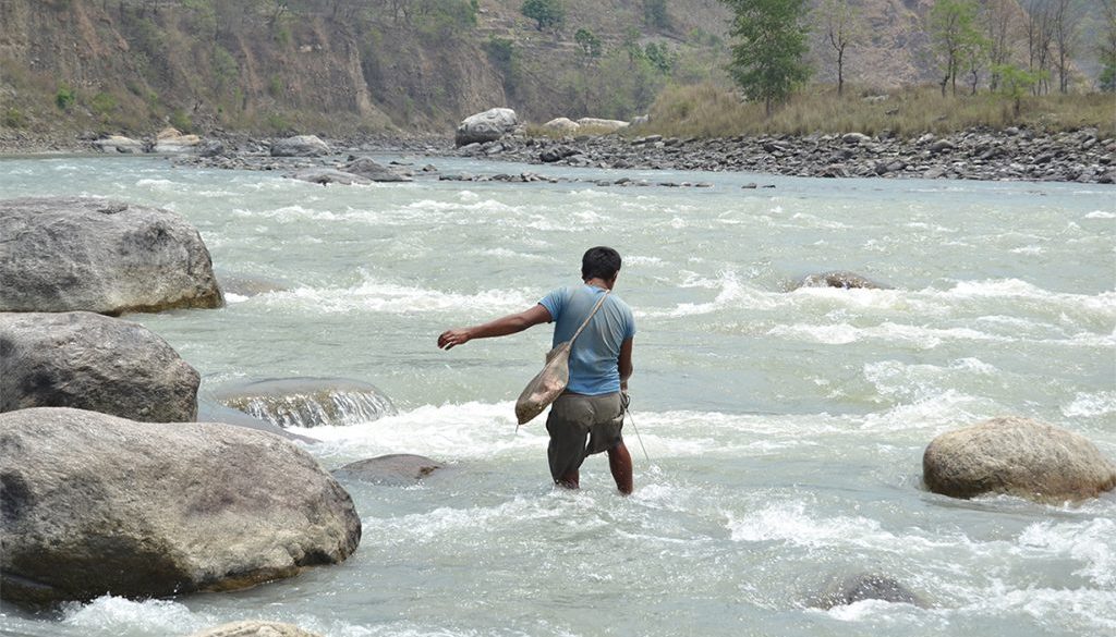 Indegenious_people-fishing-at-Khola Indegenious_people-fishing-at-Khola
